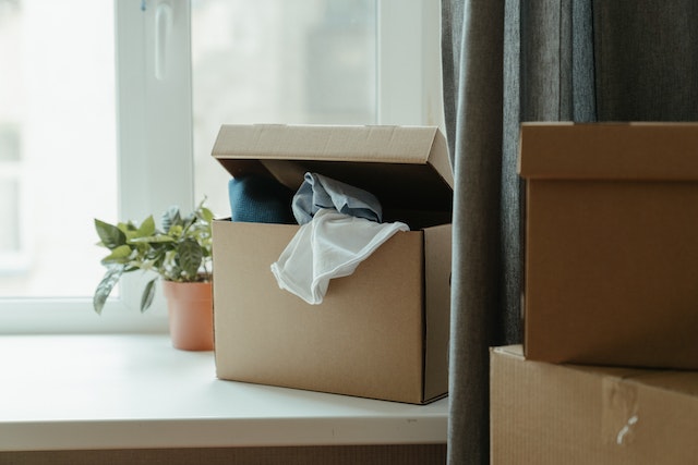 a moving box full of fabric
