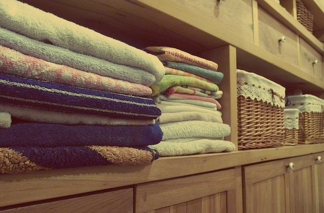 towels folded and placed in a storage solution
