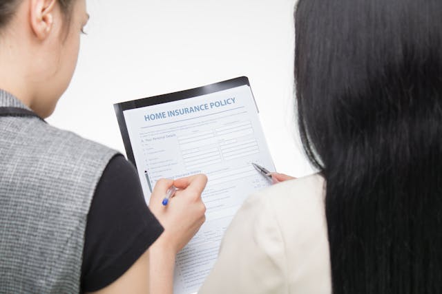 property owner looking at an insurance policy